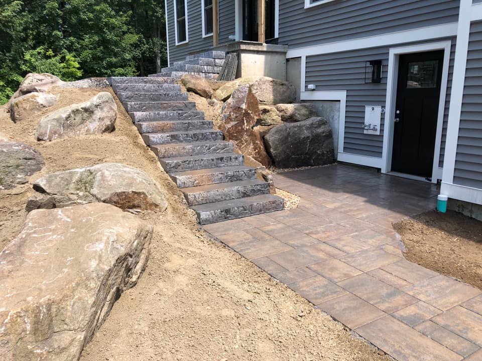 Walkway and stairs leading to the front door of a home